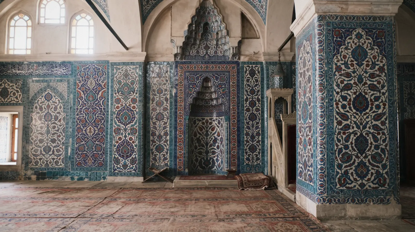 Blue and red Iznik tile panels covering the interior walls of Rustem Pasa Mosque in Istanbul, Türkiye