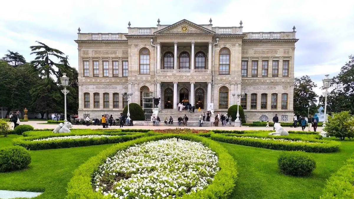 Waterfront facade of Dolmabahce Palace seen from the Bosphorus in Istanbul, Türkiye