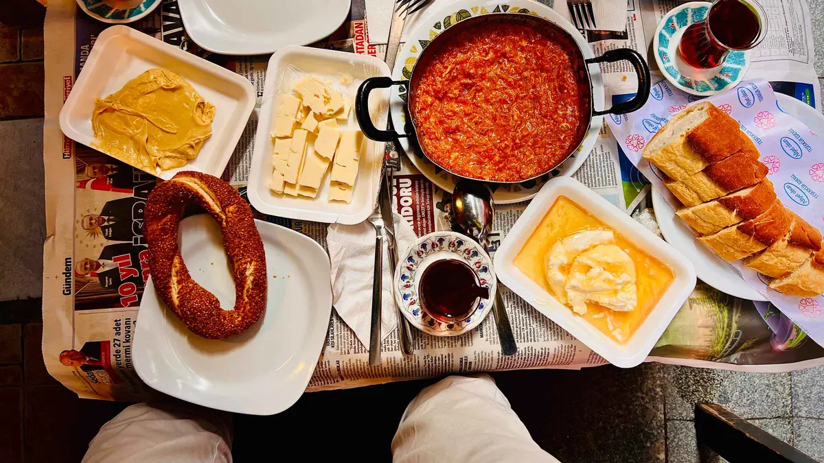 Plates of meze on a table at a food tour stop in Istanbul, Türkiye